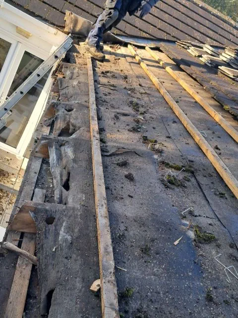 Roof repair in Carrigaline Cork replacing storm damaged tiles